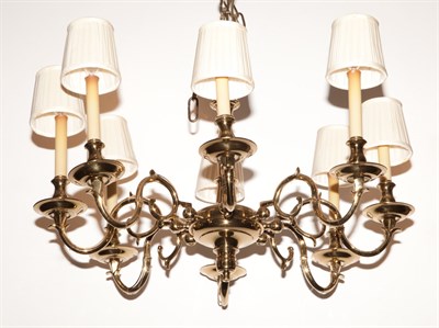 Lot 343 - Baroque Style Brass Eight-Light Chandelier...