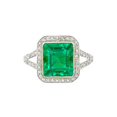 Lot 416 - Platinum, Gold Emerald and Diamond Ring