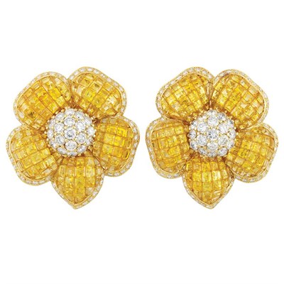 Lot 31 - Pair of Gold, Invisibly-Set Yellow Sapphire and Diamond Flower Earclips