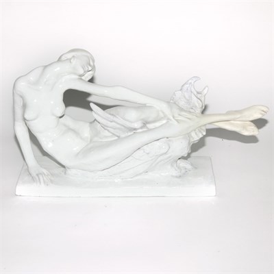 Lot 168 - White Glazed Ceramic Figure of a Woman Length...