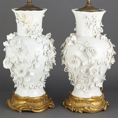 Lot 233 - Pair of Continental White Porcelain Table...