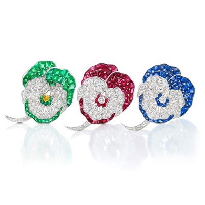 Lot 450 - Two Platinum, Diamond, Ruby and Sapphire Pansy Clip-Brooches, by Oscar Heyman Bros., and Fancy Colored Yellow Diamond, Diamond and Emerald Brooch, Udall & Ballou