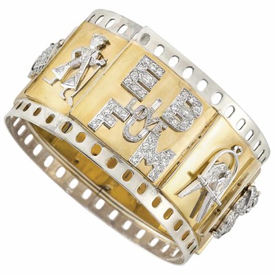 Lot 248 - Two-Color Gold, Platinum and Diamond Charm Cuff Bangle Bracelet, Trabert & Hoeffer, Mauboussin