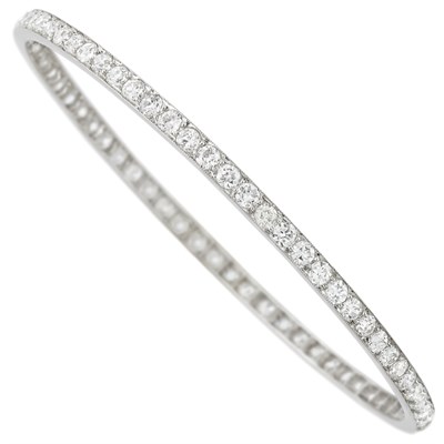 Lot 390 - Art Deco Platinum and Diamond Bangle Bracelet, Cartier
