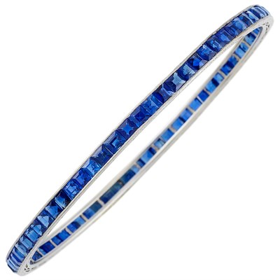 Lot 389 - Art Deco Platinum and Sapphire Bangle Bracelet, Tiffany & Co.
