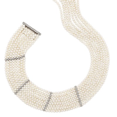 Lot 421 - Eight Strand Natural Pearl and Diamond Necklace, Cartier, Paris