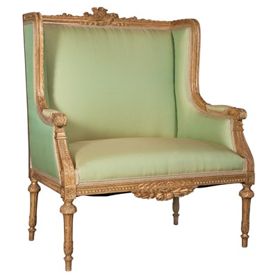 Lot 337 - Louis XVI Style Carved and Giltwood Wing Back...