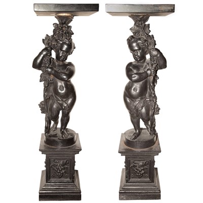 Lot 525 - Pair of Black Painted Metal Putti-Form...