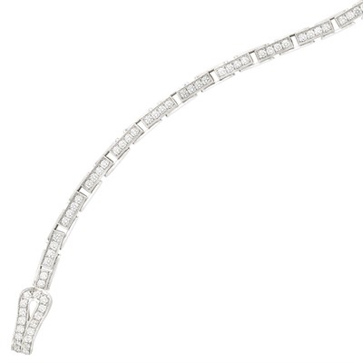 Lot 328 - White Gold and Diamond 'Agraffe' Bracelet, Cartier, France