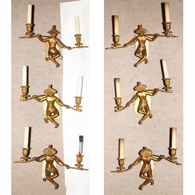 Lot 174 - Set of Six Regency Style Gilt-Metal Two-Light...