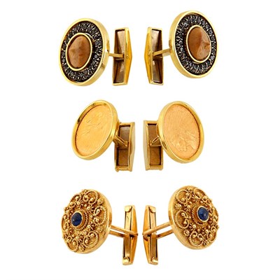 Lot 1436 - Three Pairs of Gold, Coin and Cabochon Sapphire Cufflinks