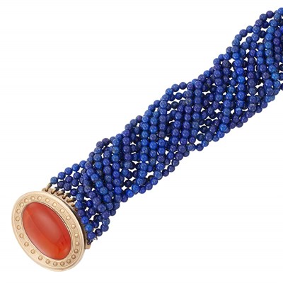 Lot 1061 - Multistrand Lapis Bead, Gold and Chalcedony Bracelet