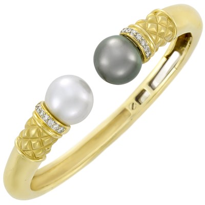 Lot 3356 - Two-Color Gold, Tahitian Gray Cultured Pearl, White Cultured Pearl and Diamond Bangle Bracelet