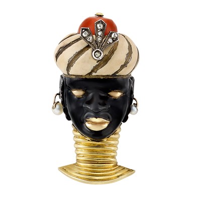 Lot 201 - Gold, Silver, Enamel, Coral and Diamond Blackamoor Clip, Cartier, Paris