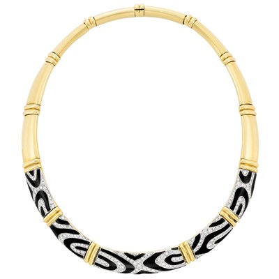 Lot 3397 - Two-Color Gold, Diamond and Black Onyx Necklace