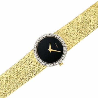Lot 213 - Lady's Gold, Black Onyx and Diamond Wristwatch, Piaget