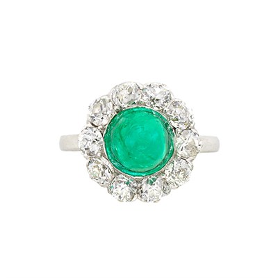Lot 1083 - Platinum, Cabochon Emerald and Diamond Ring