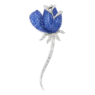 Lot 345 - White Gold, Invisibly-Set Sapphire and Diamond Flower Clip-Brooch
