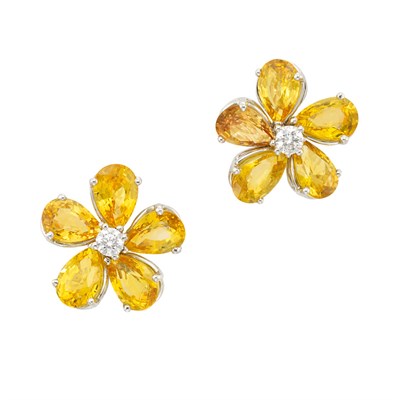 Lot 3228 - Pair of White Gold, Yellow Sapphire and Diamond Flower Earclips