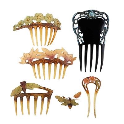 Lot 1489 - Five Acrylic Hair Combs and Pin