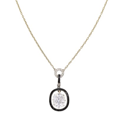 Lot 104 - Platinum, Diamond and Black Onyx Pendant with Gold Chain, France