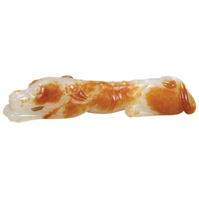Lot 87 - Chinese White and Russet Jade Hound Qing...