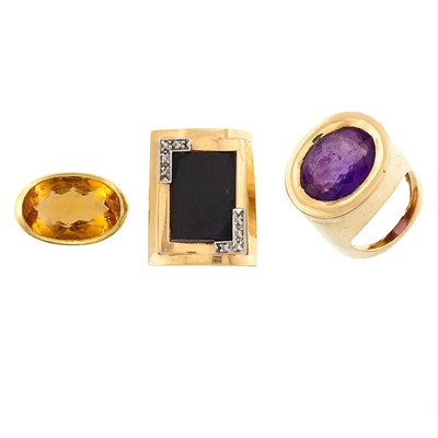 Lot 1341 - Three Gold, Multicolored Stone, Black Onyx and Diamond Rings