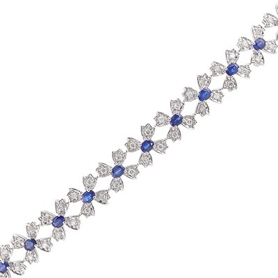 Lot 1163 - White Gold, Sapphire and Diamond Bracelet