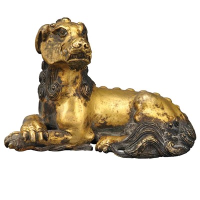 Lot 120 - Chinese Gilt-Bronze Figure of a Recumbent...