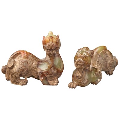 Lot 153 - Two Chinese Jade Qilin Each carved in a...