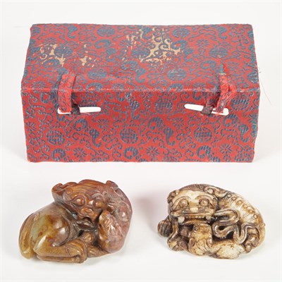 Lot 122 - Two Chinese Jade Fu Lions Each carved as a...