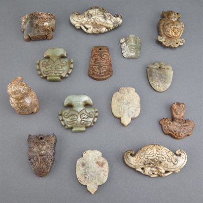 Lot 130 - Group of Fourteen Chinese Archaic Style Jade...