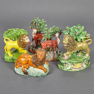 Lot 367 - Three Staffordshire Pottery Figures of Lions...