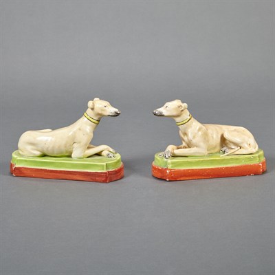 Lot 372 - Pair of Staffordshire Pottery Recumbent...