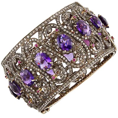 Lot 1173 - Sterling Silver, Gold, Diamond, Amethyst and Ruby Bangle Bracelet