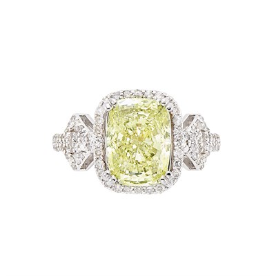 Lot 3267 - White Gold, Light Yellow Diamond and Diamond Ring