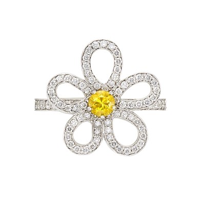 Lot 3226 - White Gold, Yellow Sapphire and Diamond Flower Ring