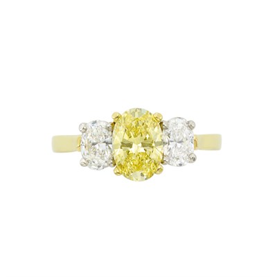 Lot 3362 - Gold, Platinum, Fancy Yellow Diamond and Diamond Ring