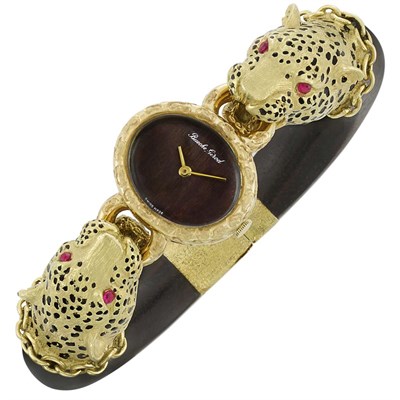 Lot 206 - Gold, Wood, Ruby and Black Enamel Leopard Bangle-Watch, Bueche Girod, France
