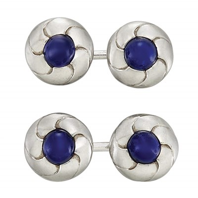 Lot 100 - Pair of Platinum and Cabochon Sapphire Cufflinks, Cartier, Paris
