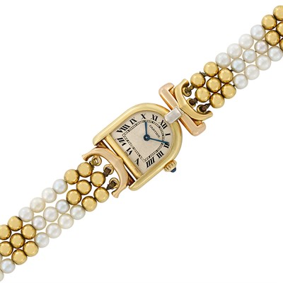 Lot 392 - Lady's Triple Strand Gold and Cultured Pearl 'Stirrup' Wristwatch, Cartier, Paris