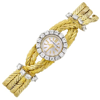 Lot 3188 - Lady's Two-Color Gold and Diamond Bracelet-Watch, Gubelin