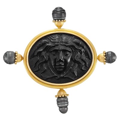 Lot 3349 - Gold, Black Baroque Cultured Pearl and Black Glass Medusa Cameo Brooch, Elizabeth Locke