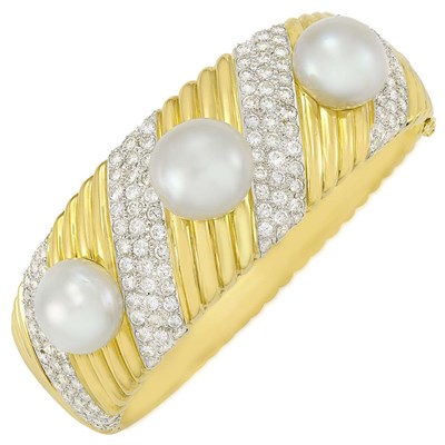 Lot 193 - Two-Color Gold, South Sea Cultured Pearl and Diamond Bangle Bracelet