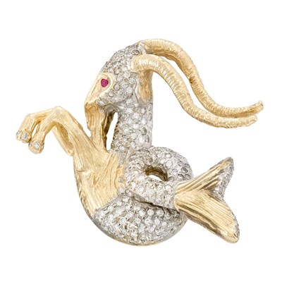 Lot 208 - Two-Color Gold, Diamond and Ruby Capricorn Brooch