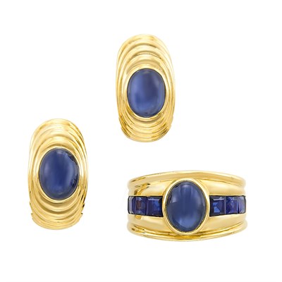 Lot 3016 - Gold and Star Sapphire Ring and Pair of Cabochon Sapphire Earrings
