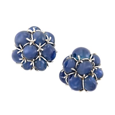 Lot 3082 - Pair of White Gold and Star Sapphire Earclips, Seaman Schepps