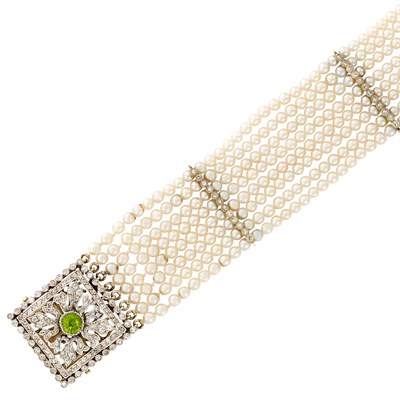 Lot 3068 - Multistrand Gold, Platinum, Diamond, Peridot and Cultured Pearl Bracelet