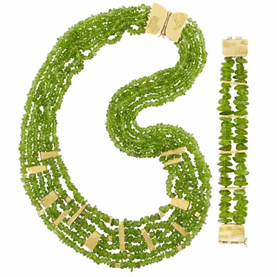 Lot 245 - Six Strand Tumbled Peridot Bead and Gold Necklace and Double Strand Bracelet