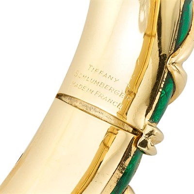 Lot 404 - Gold and Green Paillonne Enamel Bangle Bracelet, Tiffany & Co., Schlumberger, France